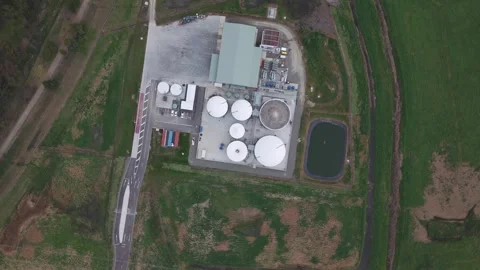 Aerial top down view of a biogas plant in the countryside Видео 343624544