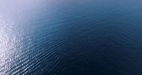Aerial top down view of blue azure turquoise sea water texture. Stock Footage 219577711