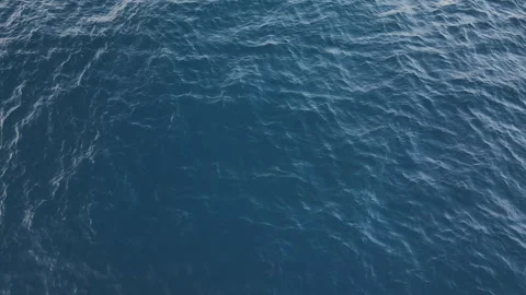 Aerial top down view of blue azure turquoise sea water texture Stock Footage 258384090