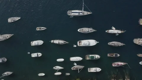 Aerial top down view of boats, yachts floating in blue sea, Portofino, Italy Stock Footage 122000307