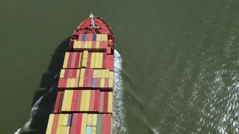 Aerial top down view of a bow from a large container cargo ship moving Stock Footage 240688380