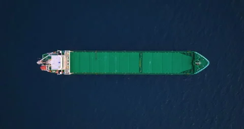 Aerial top down view of a bow from a large cargo ship traveling with speed over Stock Footage 264899150