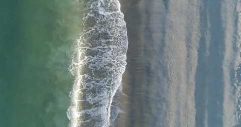 Aerial top down view of breaking wave foam The concept of power 스톡 동영상 327469843