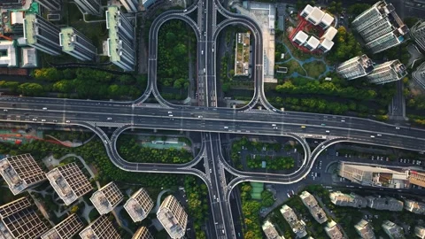 Aerial top down view of a busy junction reveals a multitude of vehicles Stock Footage 308837277