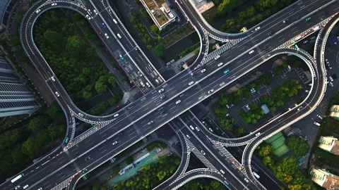 Aerial top down view of a busy junction reveals a multitude of vehicles Stock Footage 308837426