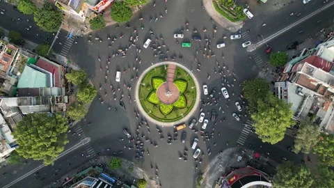 Aerial Top Down View of Busy Roundabout Traffic Flow in Ho Chi Minh City, Stock Footage 335574298