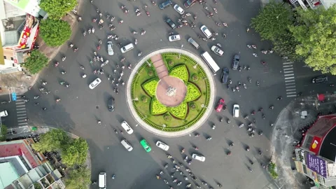 Aerial Top Down View of Busy Roundabout Traffic in Ho Chi Minh City, Vietnam Stock Footage 335574353