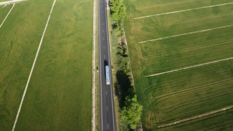 Aerial top down view of cargo truck on rural road in Spain 動画素材 332558585
