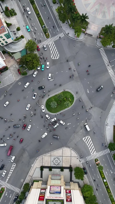 Aerial Top Down View of Chaotic Traffic Roundabout in Hue, Vietnam Stock Footage 335836679