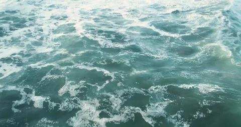 Aerial top-down view of churning ocean water texture Stock-Footage 316637221