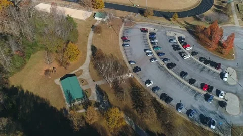 Aerial Top Down View Circling Parking Lot At Busy Park Stock Footage 219031075