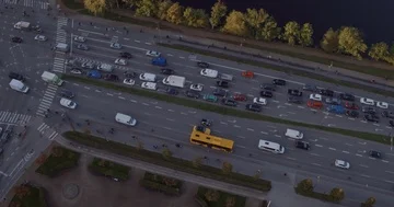 Aerial top-down view of city traffic - cars, busses, bicycles, pedestrians Stock Footage 85634047