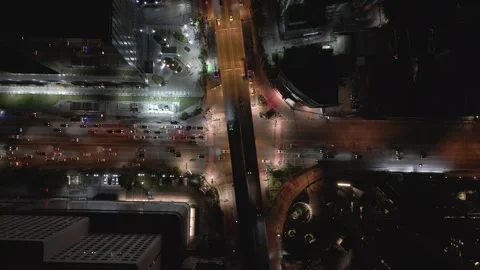 Aerial Top Down View of City Traffic Intersection at Night in Bangkok, Thailand Stock Footage 333598246