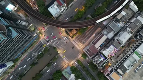 Aerial Top Down View of City Traffic Intersection at Night in Bangkok, Thailand Stock Footage 334124058