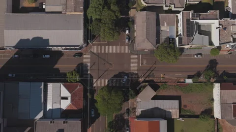 Aerial Top Down View of City Street Crossing With Cars and Crosswalks 動画素材 346069128
