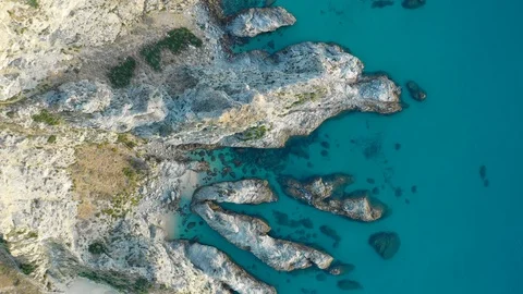 Aerial top down view of the cliffs and coastline Stock Footage 117802020