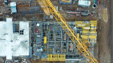 Aerial top down view of a construction site of with an apartment building Stock Footage 166239695