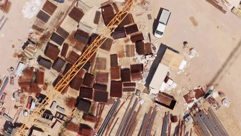 Aerial top-down view of construction site material storage yard Stock Footage 337639465