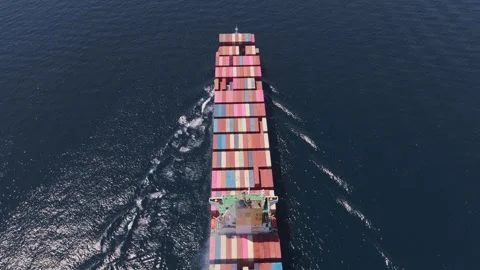 Aerial top down view of container ship cruising on the ocean 스톡 동영상 336719408
