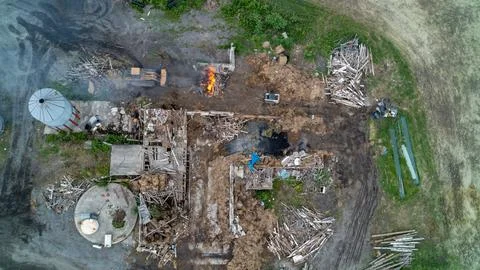 Aerial Top Down View of Controlled Barn Fire Demolition and Debris on Farm Stock Photos