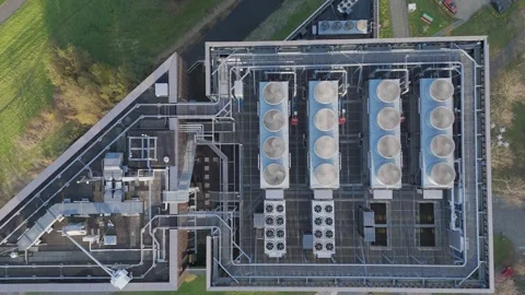 Aerial Top Down View of Cooling Systems on Modern Data Center Roof Stock Footage 322607035
