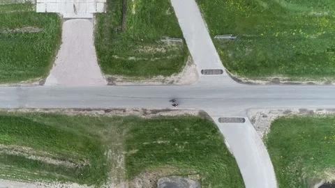 Aerial top down view of couple cycling alongside each other 4k Stock Footage 118803605