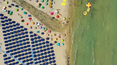 Aerial top down view of the crowded beach and the sea Stock Footage 112150944