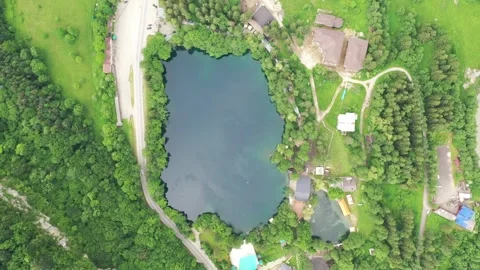 Aerial top-down view of the deep Blue Lake in Kabardino-Balkaria Stock Footage 338015132