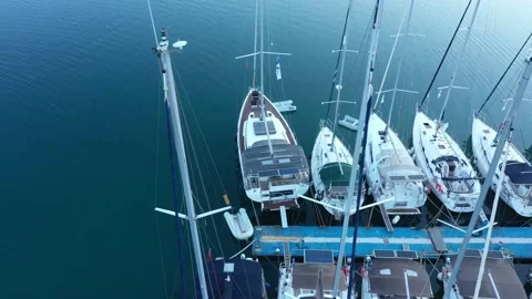 Aerial top-down view of docked sailboats.  Top down view of yachts in the marina Stock-Footage 203812321