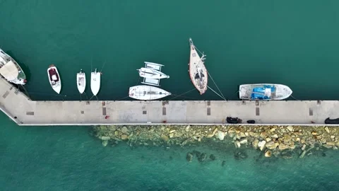 Aerial top down view of docked fishing sailboats and yachts Stock Footage 278716807