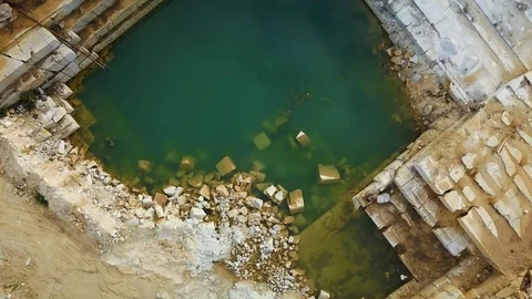 Aerial top down view. Drone flight over the stone quarry Stock Footage 94601639