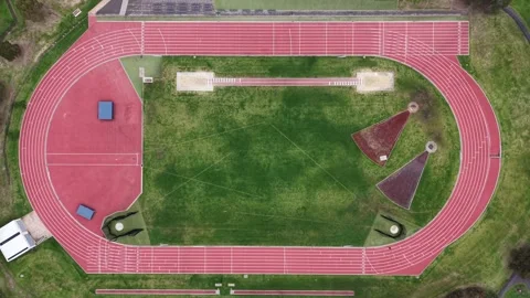 Aerial top down view of empty athletic running track Stock Footage 337811118