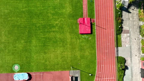 Aerial Top Down View Of Empty Running Track And Sports Field Stock Footage 346896727