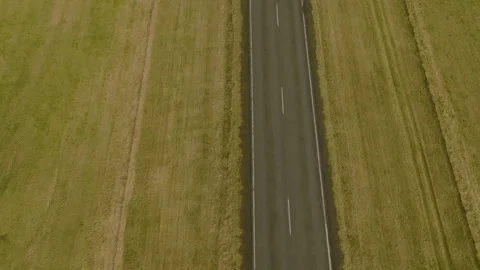 Aerial Top Down View Of Empty Asphalt Road In Iceland Landscape Stock Footage 348084574