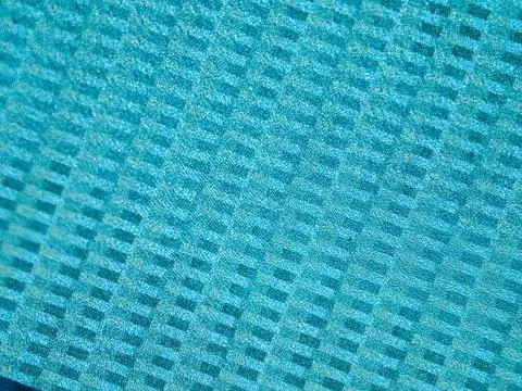Aerial top down view of an empty resort swimming pool with sunbeds Foto stock