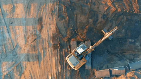 Aerial top down view of an excavator works on a development land (building plot) Vídeos de archivo 229651303