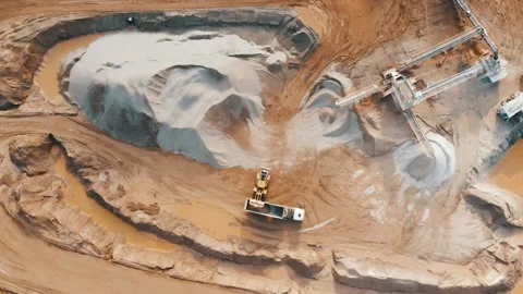 Aerial top down view of excavator loading crushed stone into truck in crushed 스톡 동영상 237265069