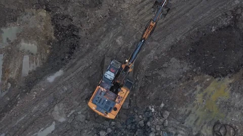 Aerial top down view of an excavator on construction site Stock Footage 334533377