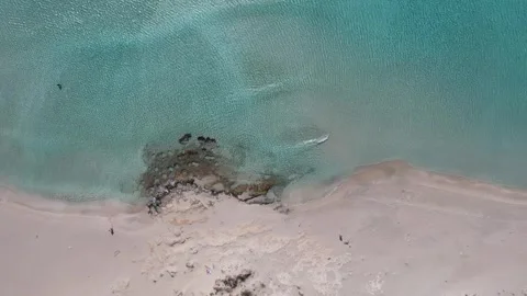 Aerial top down view of exotic beach waves and turquoise sea in Greece Video stock 337046062