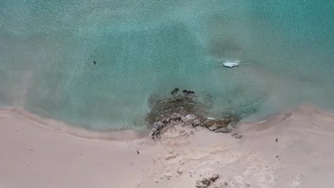 Aerial top down view of exotic beach and turquoise sea in Greece Stock Footage 337046262