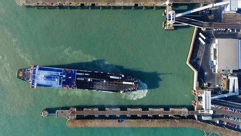Aerial top down view of ferry docking at port 4k Stock Footage 105501584