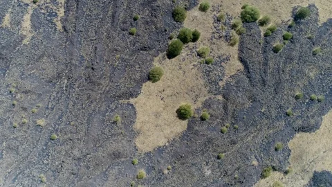 Aerial top down view flight over volcanic landscape 4k Stock Footage 89292724