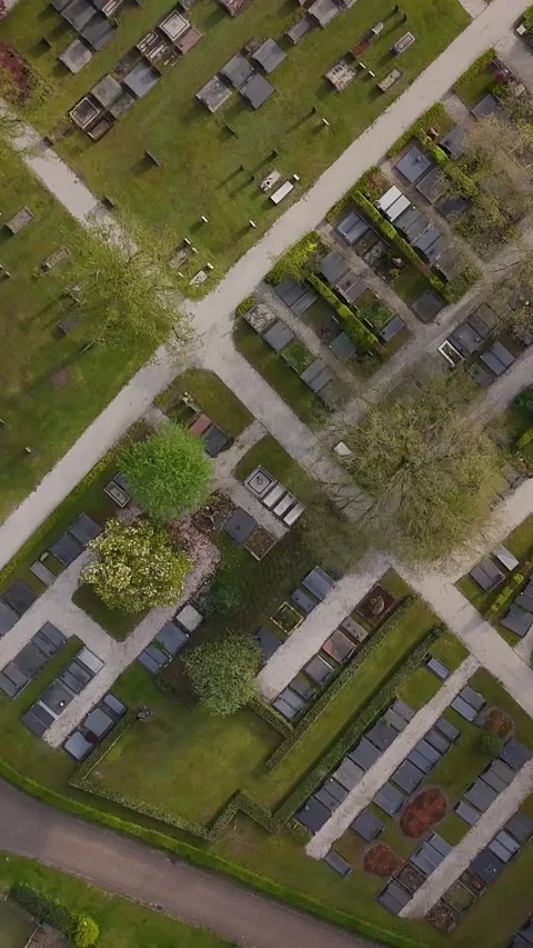 Aerial Top Down View Flying Over Graveyard With Tombstones And Trees Stock Footage 335476053