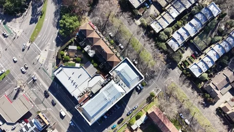 Aerial top down view flying over urban cityscape roads Video stock 340381657