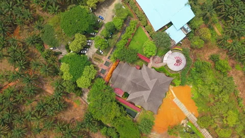 Aerial Top-Down View of Forest Landscape and Rural Eco Village in Malaysia Stock Footage 322885644