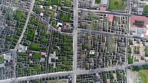 Aerial top down view gaining altitude above Pompeii 4k Stock Footage 89956830