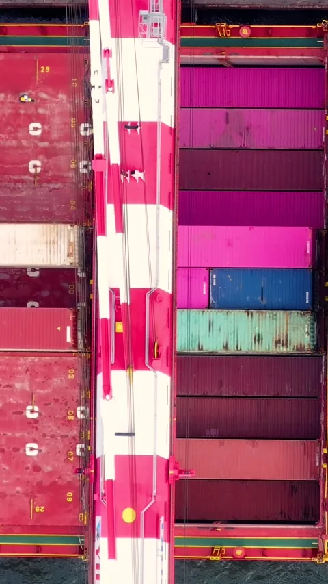 Aerial top down view of gantry crane loading cargo ship containers Stock Footage 340581852
