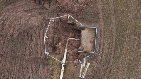 Aerial top down view of gas pipeline maintenance site in Poland field Stock Footage 335047570
