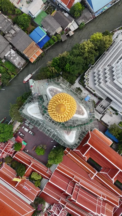 Aerial Top Down View of Giant Golden Buddha in Bangkok, Thailand Stock Footage 335943177