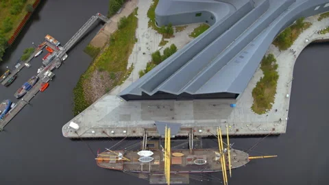 Aerial top down view of Glasgow's Riverside Museum of Transport Stock Footage 336779754